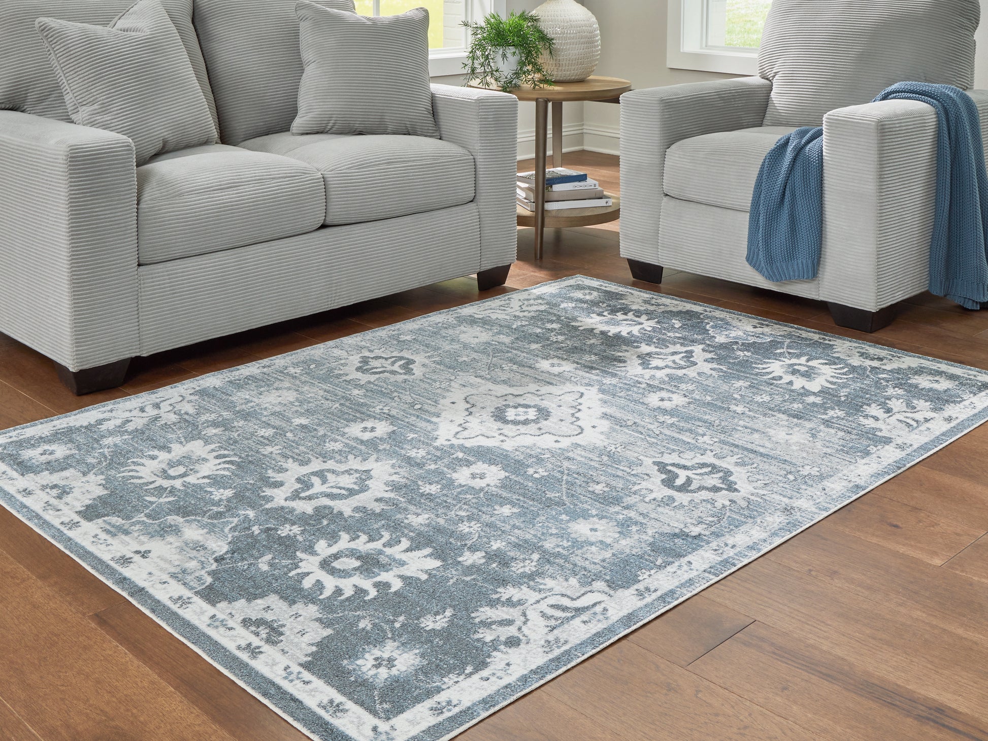 Ocala Furniture Outlet - Ashley Furniture - Avanworths Rug - Washable 7'10" x 10' Area Rug / Blue/Gray/Ivory - R407791