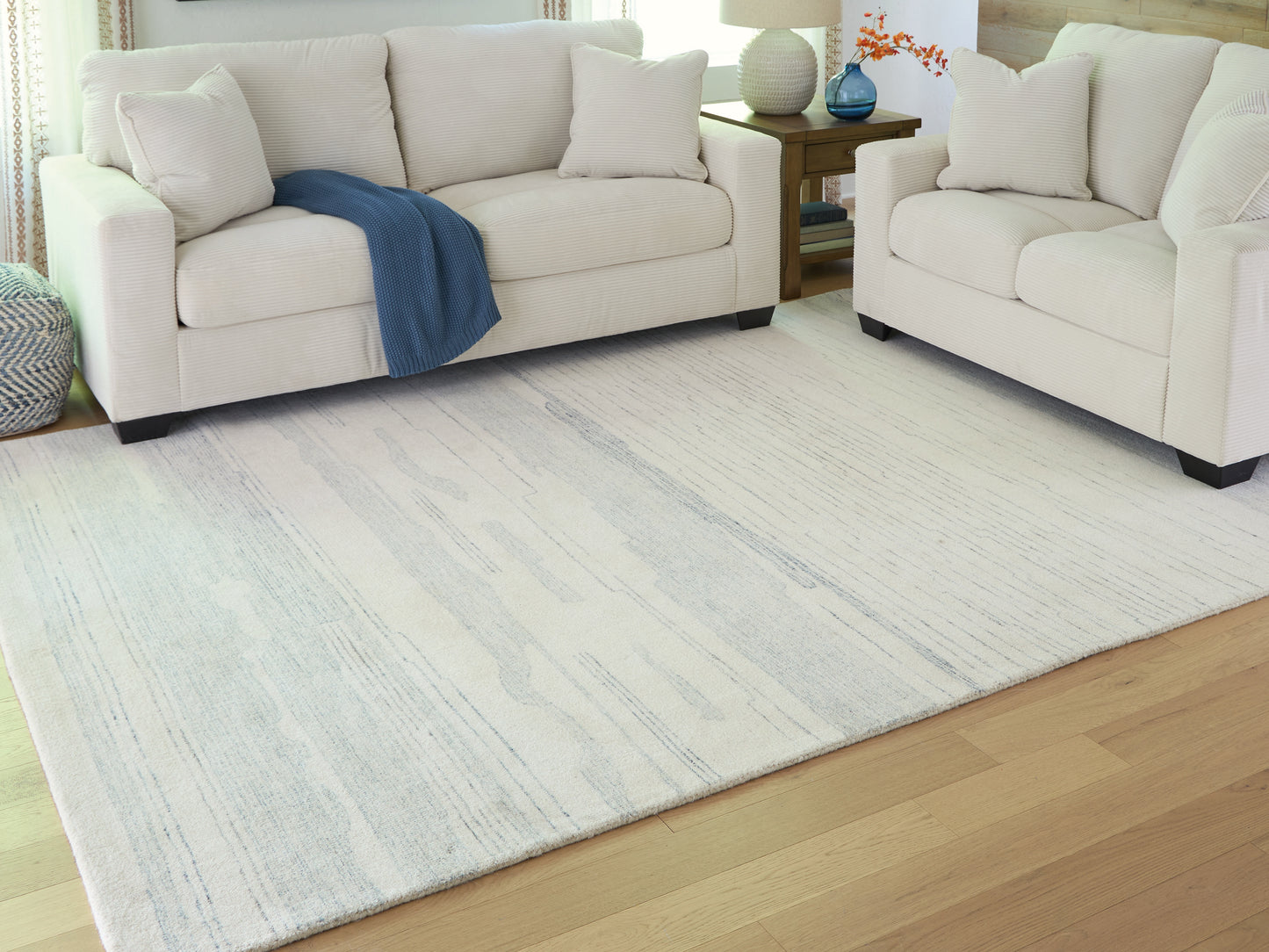 Ocala Furniture Outlet - Ashley Furniture - Genemost Rug - 7'8" x 10' Area Rug / Ivory/Blue - R407841