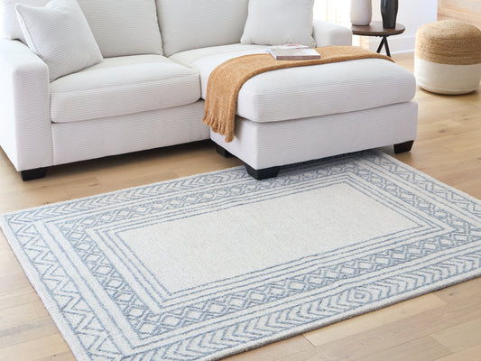 Ocala Furniture Outlet - Ashley Furniture - Azelhurst Rug - 7'8" x 10' Area Rug / Blue/Ivory/Gray - R407851